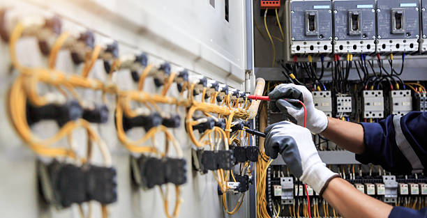 Professional Electrician technician working in River Bend, NC